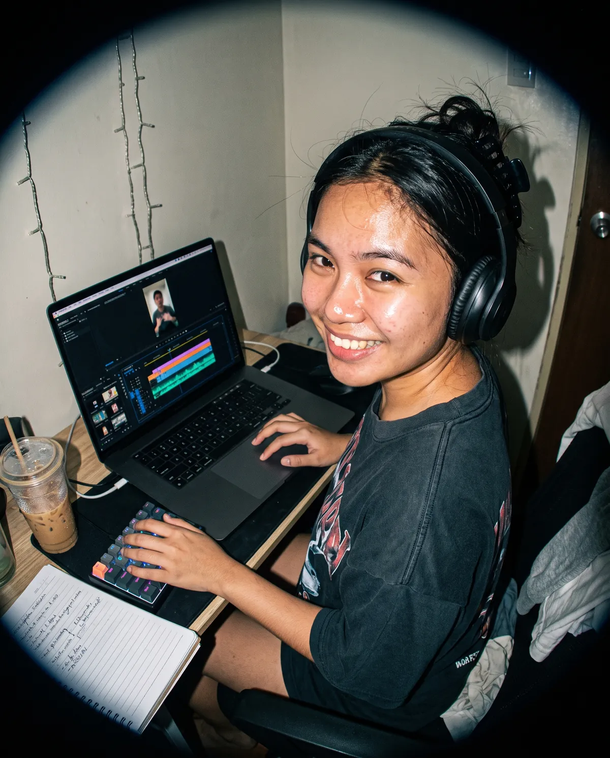 editor cutting a vertical ad on a laptop timeline